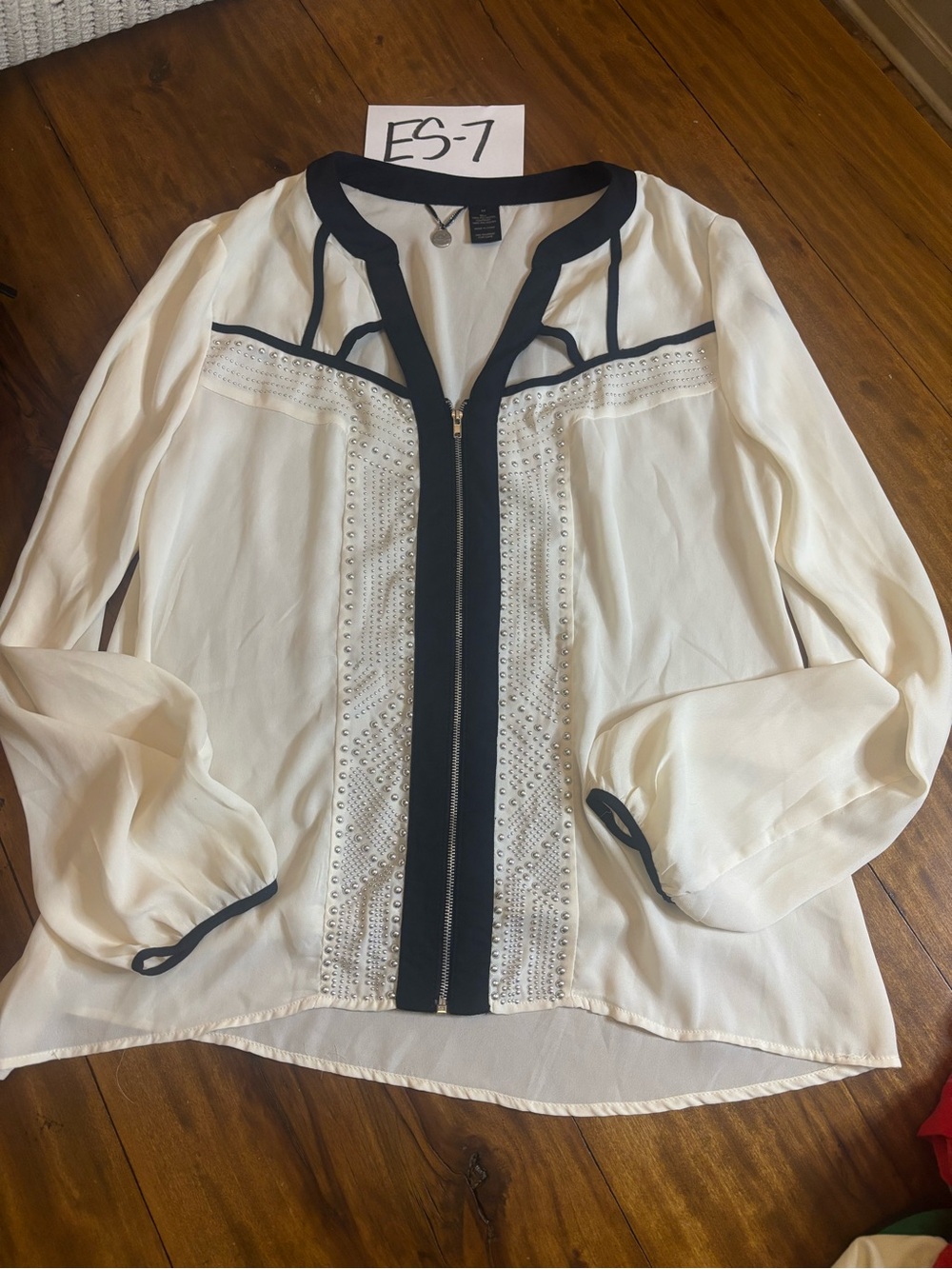 Buckle Cream Blouse with Black Trim and Studded Zip Front